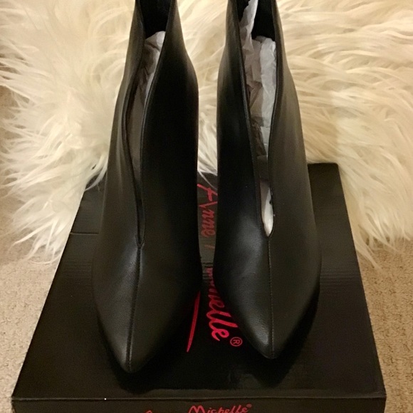 Sleek Cutout Black Ankle Boots NWT - Picture 2 of 6